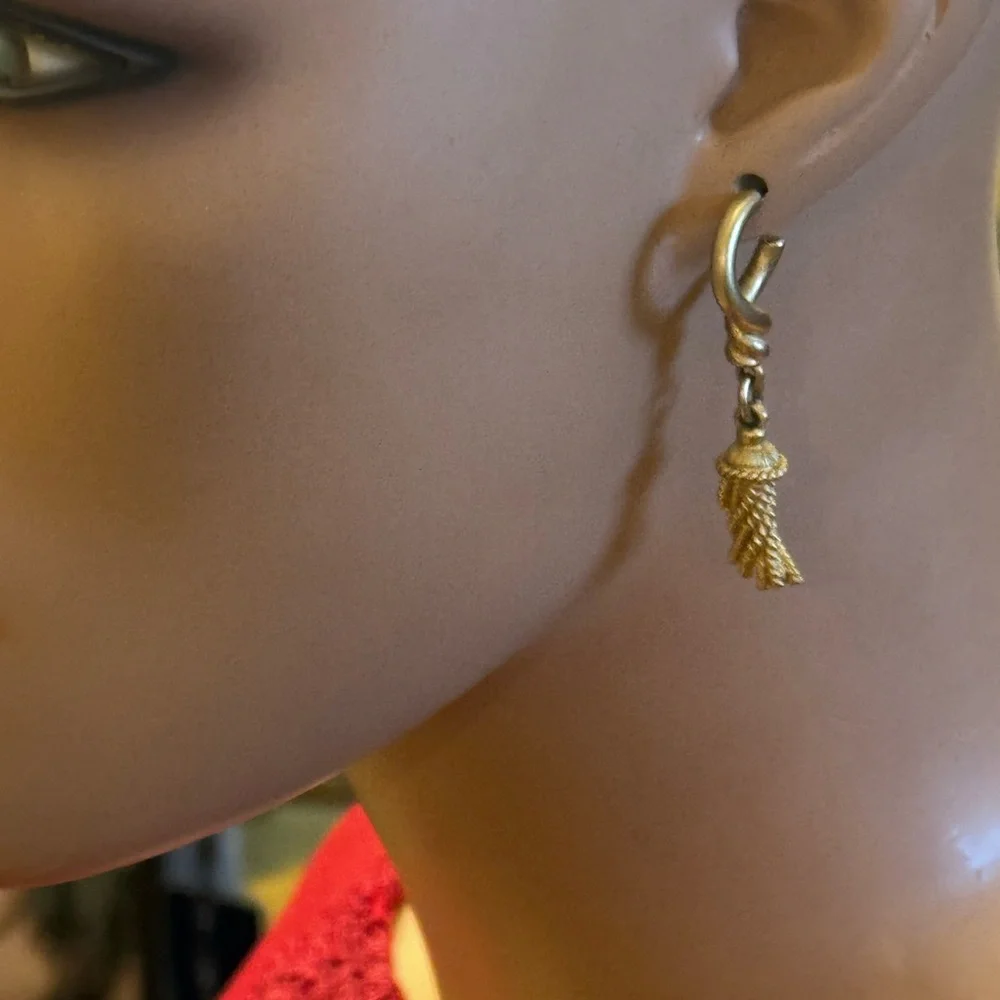 Gold tone rope tassel earrings